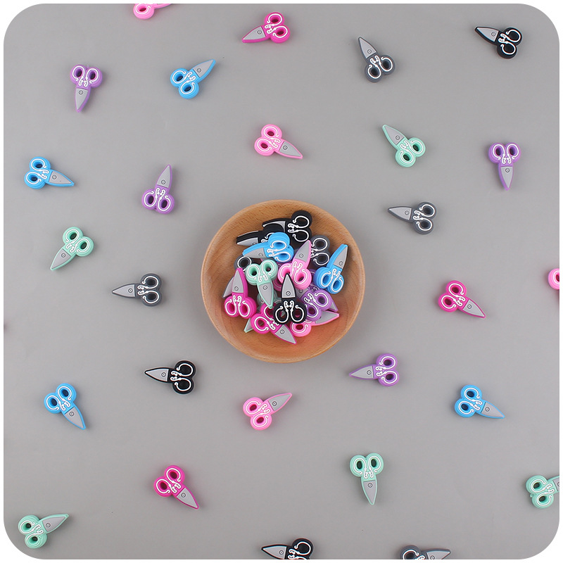 Nuevo bebé suministros de dibujos animados tijeras pequeño mordedor creativo DIY bebé molar pezón cadena anti-caída cadena Accesorios