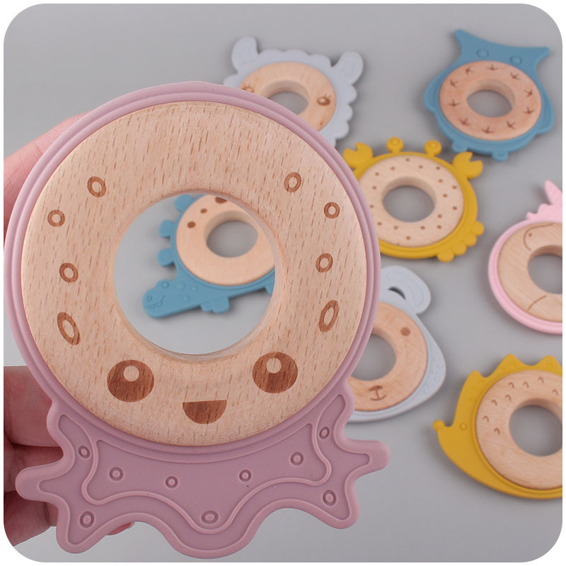 Nuevo bebé suministros de dibujos animados serie Animal anillo de madera mordedor bebé creativo mordedura de goma molar juguete de haya