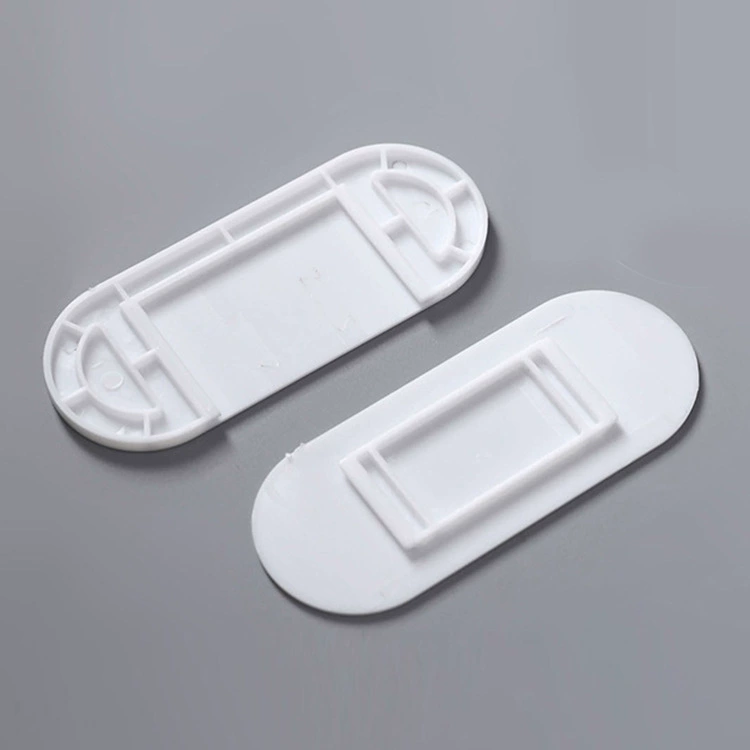 Plug in the fixed -fixed socket plug -in board fixed device to move the punch -free hanging wall paste sticker
