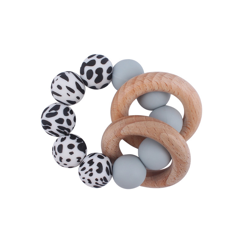 Nuevo bebé suministros de silicona leopardo cuentas mordedor pulsera calmante bebé DIY mordedura de silicona juguete de haya