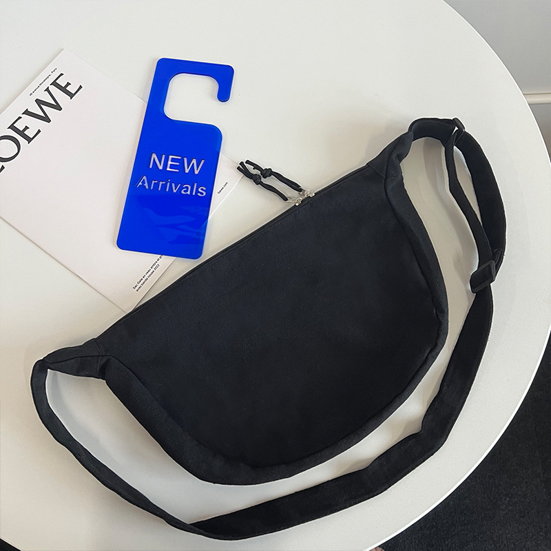 Fabricante nuevo lienzo bolsa de mensajero de los hombres y las mujeres del mismo estilo ins nicho versátil gran capacidad moda Commuter dumpling bolsa
