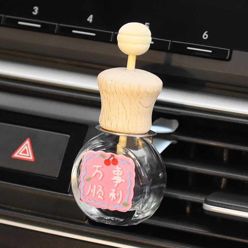 Clip de aromaterapia de coche, texto auspicioso, botella vacía, botella volátil, decoración de salida de aire de coche, fragancia de coche linda de dibujos animados