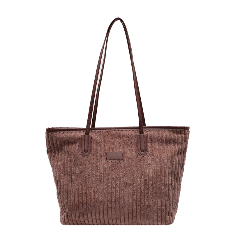 Verano 2024 invierno de gran capacidad de meandruño nuevo nicho simple de viaje de mano bolsa de hombro para mujeres