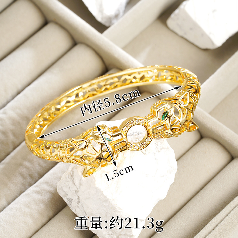 Nuevos productos de oro de arena galvanizado 18k pulsera de fijación ligera de lujo ojos verdes cabeza de leopardo hueco anillo de alquiler no se pierde joyería