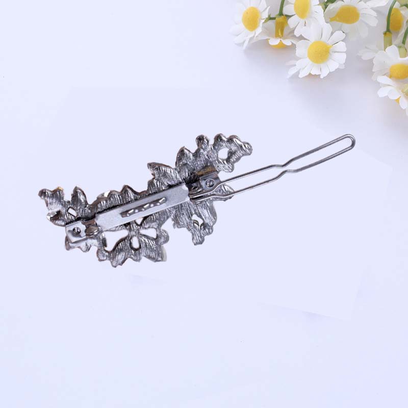 Yiwu moda temperamento calle tiro flores horquilla clip lateral venta al por mayor Fabricantes europeos y americanos retro flash diamante accesorios para el cabello al por mayor