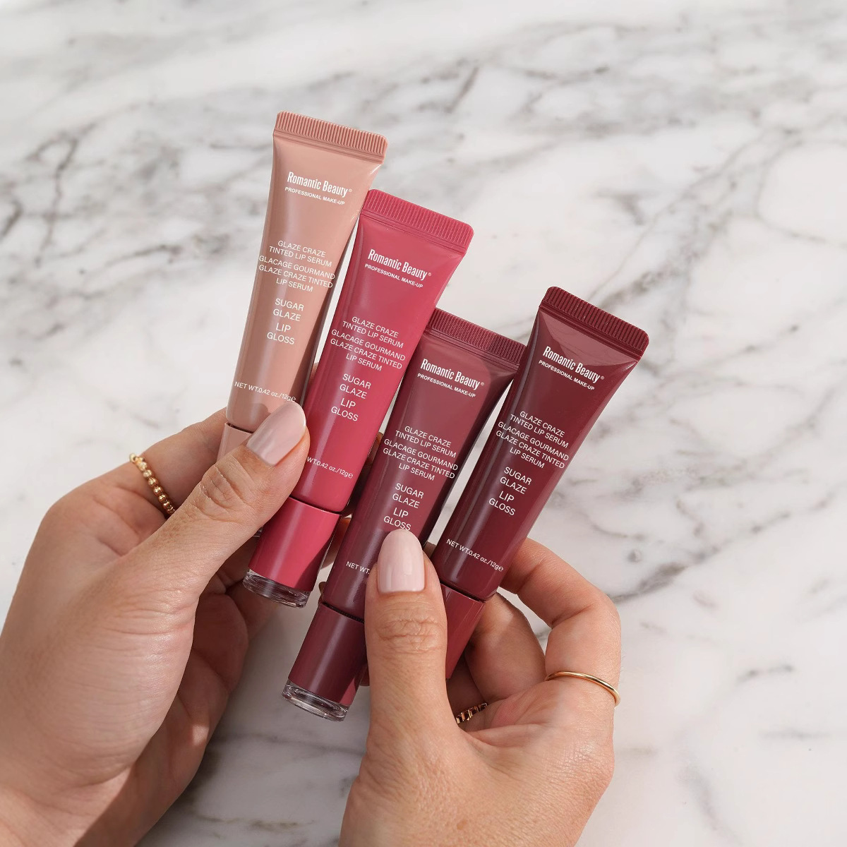 Lápiz labial explosivo transfronterizo, aceite de labios coloreado, brillo de labios, agua hidratante para labios, crema hidratante para labios ligera y brillante, personalización OEM