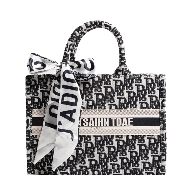 Bolso de tela transfronterizo para mujer 2025: moda de tendencia, gran capacidad, bolso de hombro de alta gama, versátil y a la última.