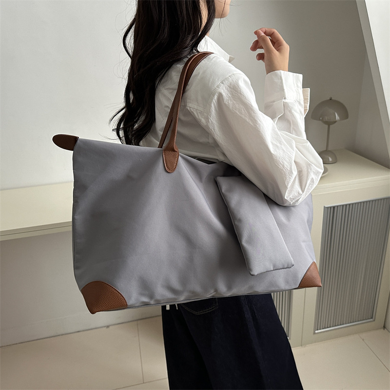 Bolsa de viaje para mujeres 2024 nueva sensación de alto nivel bolsas de bolsas de viajes portátiles bolsas de bolsas de moda de hombro de gran capacidad para mamá