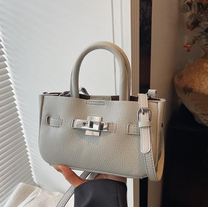 Alto sentido de lichi estampado bolso de mano Kelly2025 nuevo comercio exterior super caliente viaje bolsa de cubo de agua de moda bolsa de mochila versátil