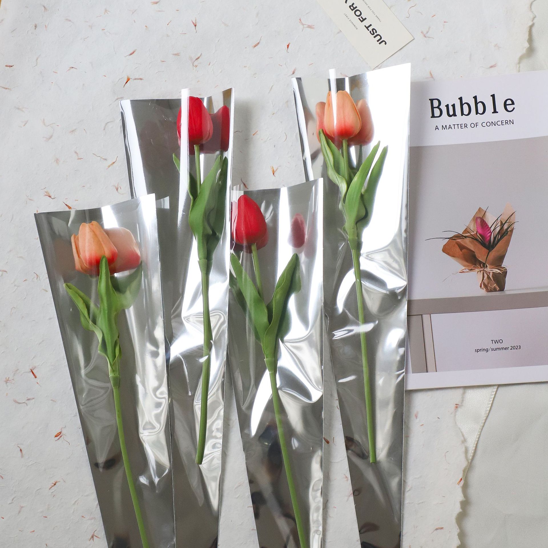 Li Zhi Ran espejo rosa bolsa única impermeable simple reflectante bolsa de flores