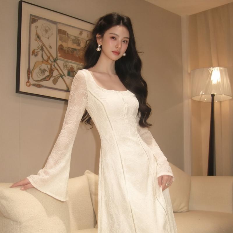 From a moment, a paisley wool lace knit dress with a square neckline, slightly flared sleeves, and a slim-fit, figure-flattering silhouette