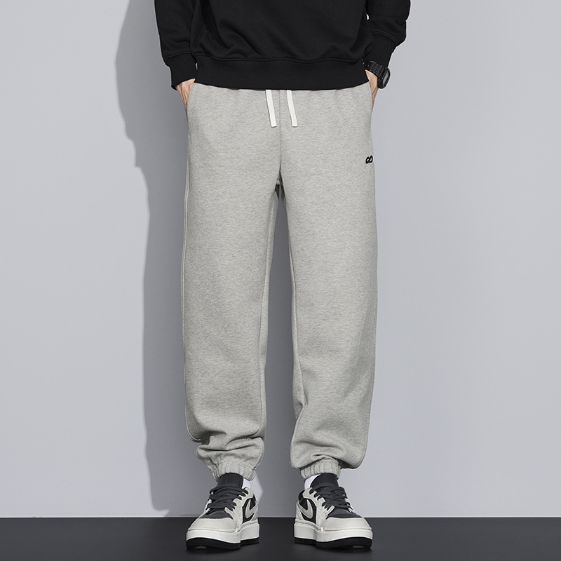 2025 nuevo estilo primavera y otoño suelto pie rectas bordado pantalones masculinos japoneses retro suelto pantalones de tendencia versátil