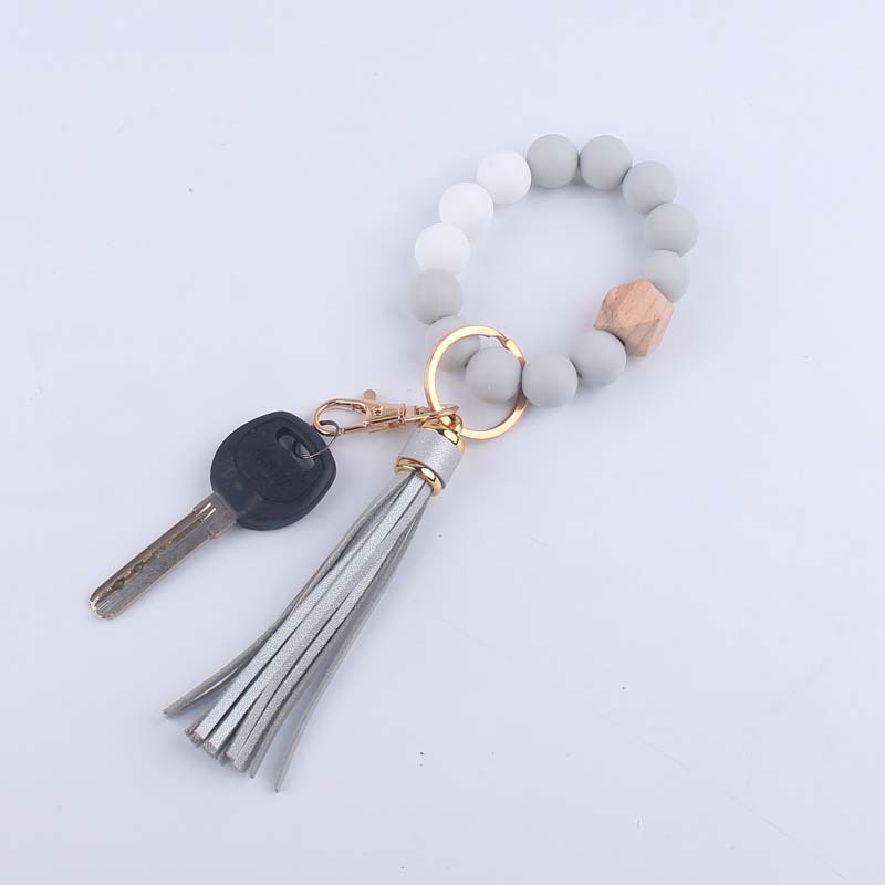 Pulsera de silicona pulsera llavero nuevo creativo DIY borla colgante contraste color