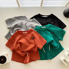 夏の服の韓国版の薄いタイプの揚げた街の子供服の綿のワッフルの子供の2つのセットの男女の子供のレジャーのスーツ