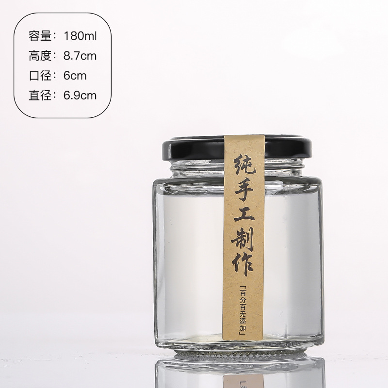 Hexagonal de vidrio enlatado sellado de grado alimenticio con tapa vacía un kilo de pasta de limón, miel, pimienta, botella de mermelada