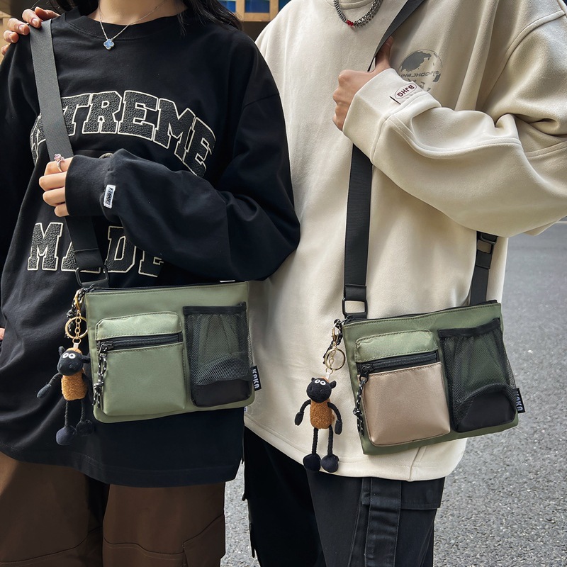 Bolso de hombro transfronterizo de gran capacidad, bolso de correo universal, bolso coreano, bolso de estilo casual, bolso de mano para hombres y mujeres.