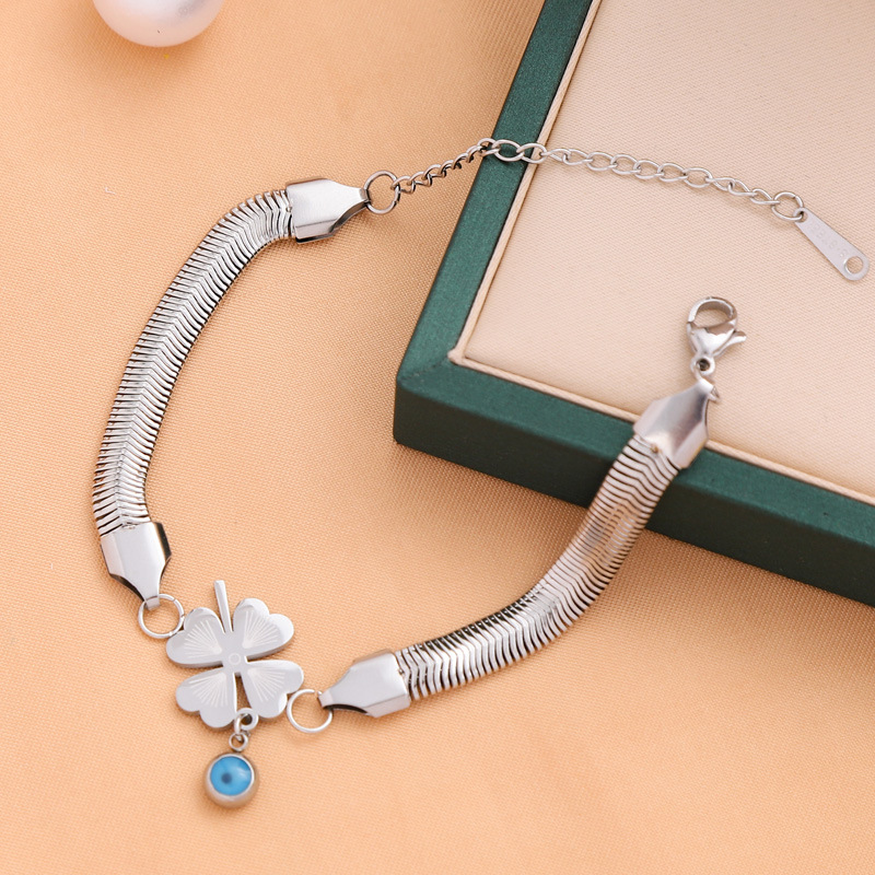 Europa y los Estados Unidos venta al por mayor transfronteriza caliente cadena de cuchillas de acero de titanio amor ojos azules pulsera de acero de titanio mujer oro no decoloración joyas
