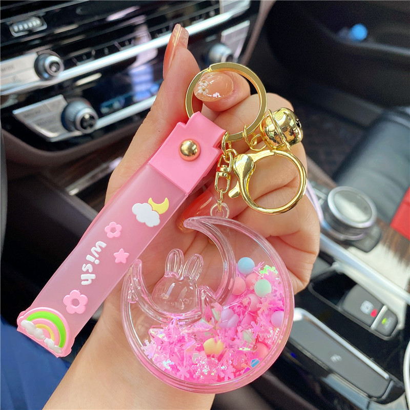 Red de aceite creativo rojo luminoso copo de nieve estrella Luna conejo Quicksand botella llavero femenino lindo Quicksand botella colgante bolsa adornos