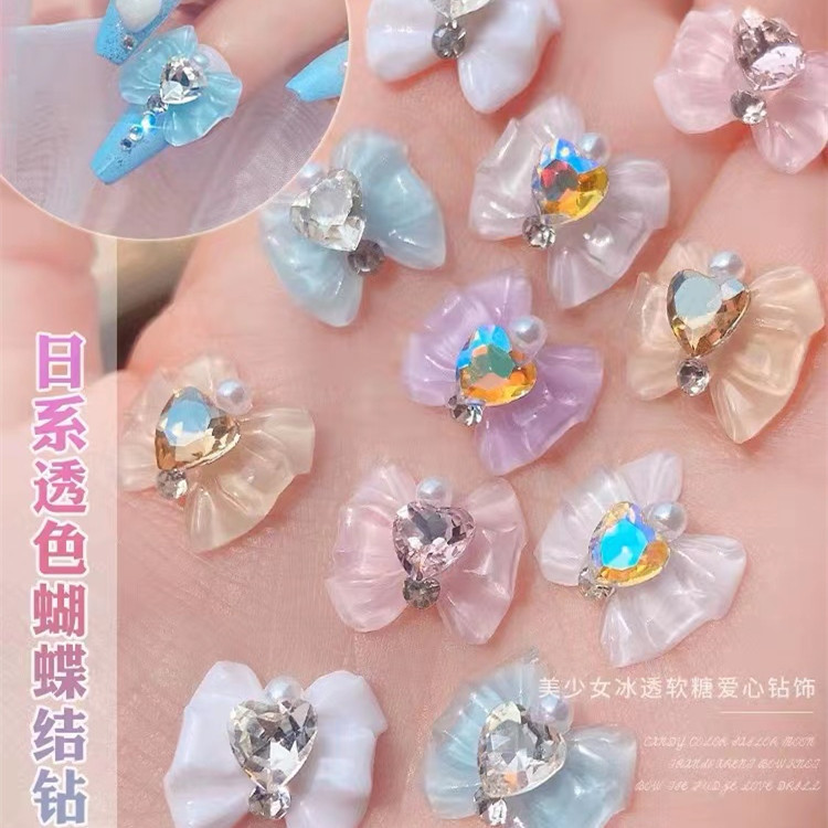 White nail decoration with bow