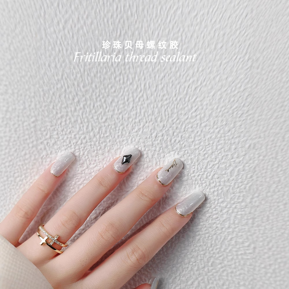 Internet celebridad universal perla fritillary textura esmalte de uñas pegamento 2021 nuevo otoño y el invierno popular francés borde dorado super brillante blanco