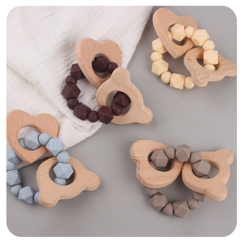 Nuevos artículos para bebés dibujos animados cabeza de haya creativo bebé silicona mordiendo dientes molares pulsera de goma de diente