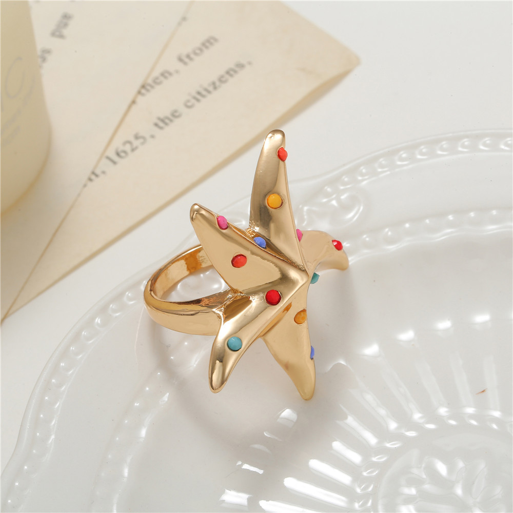 Korean New Starfish Five-pointed Star Dripping Oil Alloy Ring display picture 3