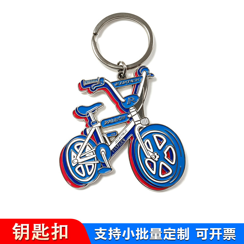 Customized bicycle-shaped metal keychain with enamel coating and resin finish, souvenir gift for bike exhibitions, with custom logo Customized bicycle-shaped metal keychain with enamel coating and resin finish, souvenir gift for bike exhibitions, with custom logo