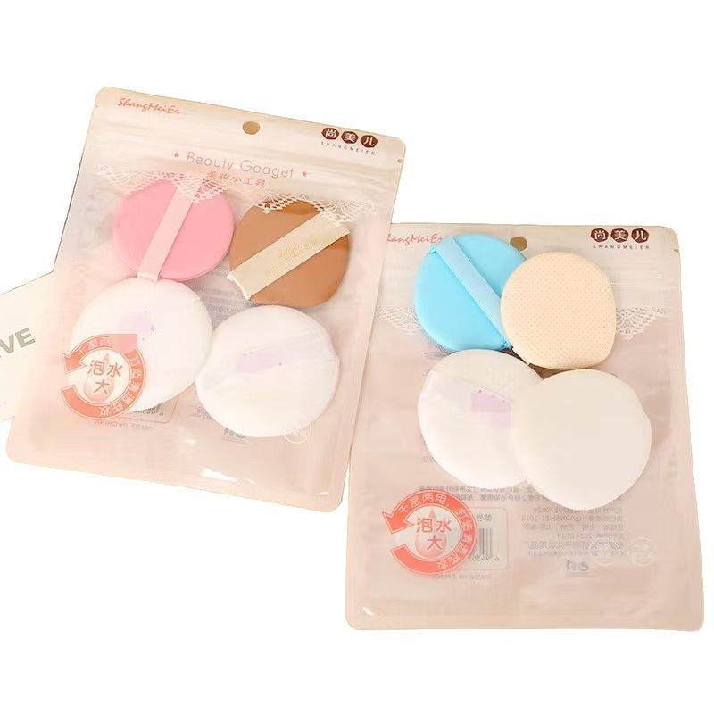 Polvo de cojín de aire con bolsa de almacenamiento huevo de maquillaje redondo dos conjuntos de polvo de marshmallow seco y húmedo al por mayor