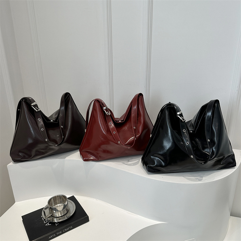 2025 nueva bolsa de hombro suave casual minimalista estilo coreano de personalidad para mujeres gran capacidad bolsa de mano mochila