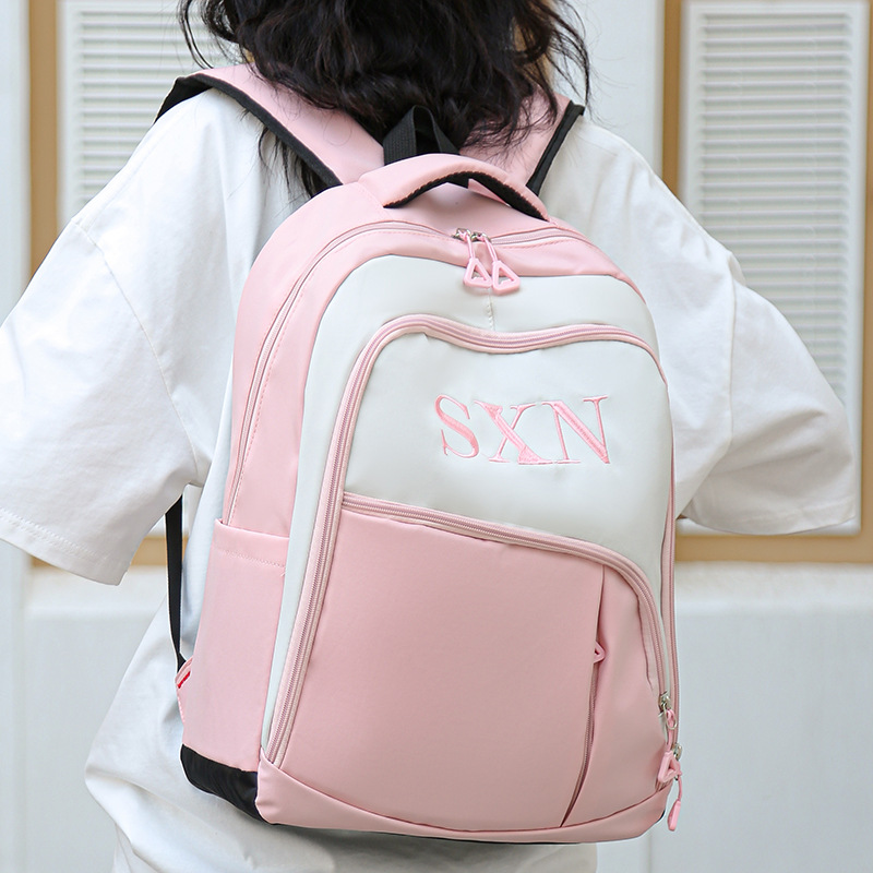 Mochila de tendencia coreana nueva moda de gran capacidad mochila escolar escolar de color simple de contraste de la escuela secundaria mochila de viaje