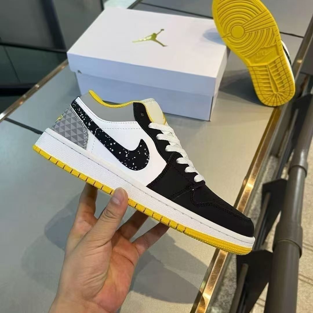 Chunyuan AJ1 Meituan negro, blanco y amarillo campus de moda baja pareja de hombres y mujeres zapatos de skate casuales
