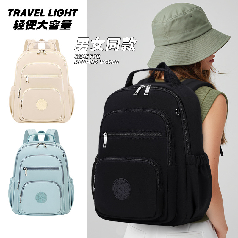 Mochila impermeable de gran capacidad para mujer, nueva colección 2025, venta al por mayor del fabricante, mochila de doble hombro de color sólido, bolso de gran capacidad con múltiples bolsillos