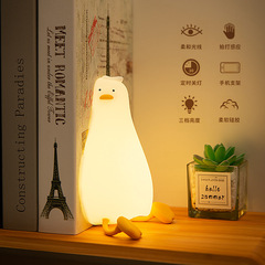 Lying duck silicone lamp USB charging with mobile phone holder silicone lamp children's home bedroom pat night light