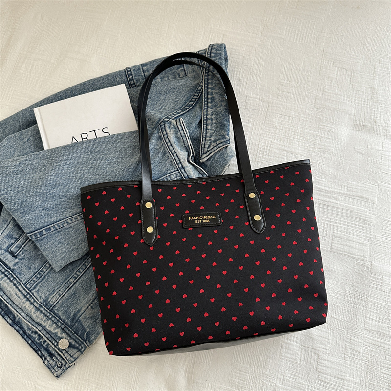 Bolsa de invierno de otoño y invierno de gran capacidad para mujeres 2024 nueva moda onda punto bolso de hombro de moda bolso de mano de viaje