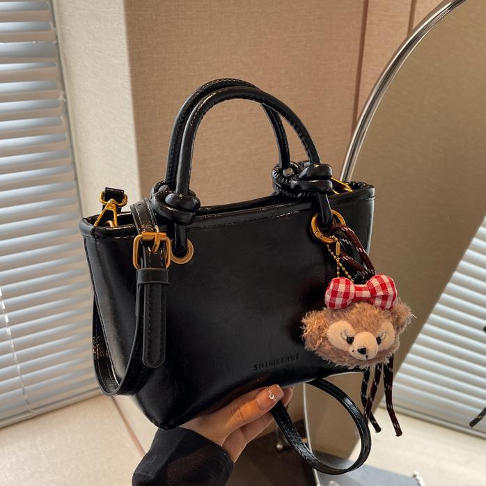 Otoño y invierno Meirad bolsos de mujer 2024 nueva moda moda bolsos de cubo de mano alta sensación de mochila versátil