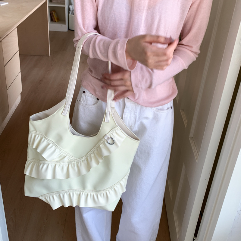 Versión coreana del bolso de nicho 2025 verano nuevo bolso femenino lindo bolso de encaje casual bolso de hombro de gran capacidad