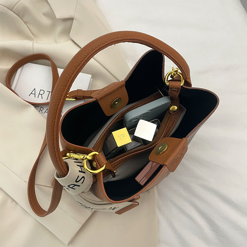 Cross-border 2025 otoño y invierno nuevo bolso de moda bolso de cubo de empalme bolso de mujer bolso de hombro bolso de moda