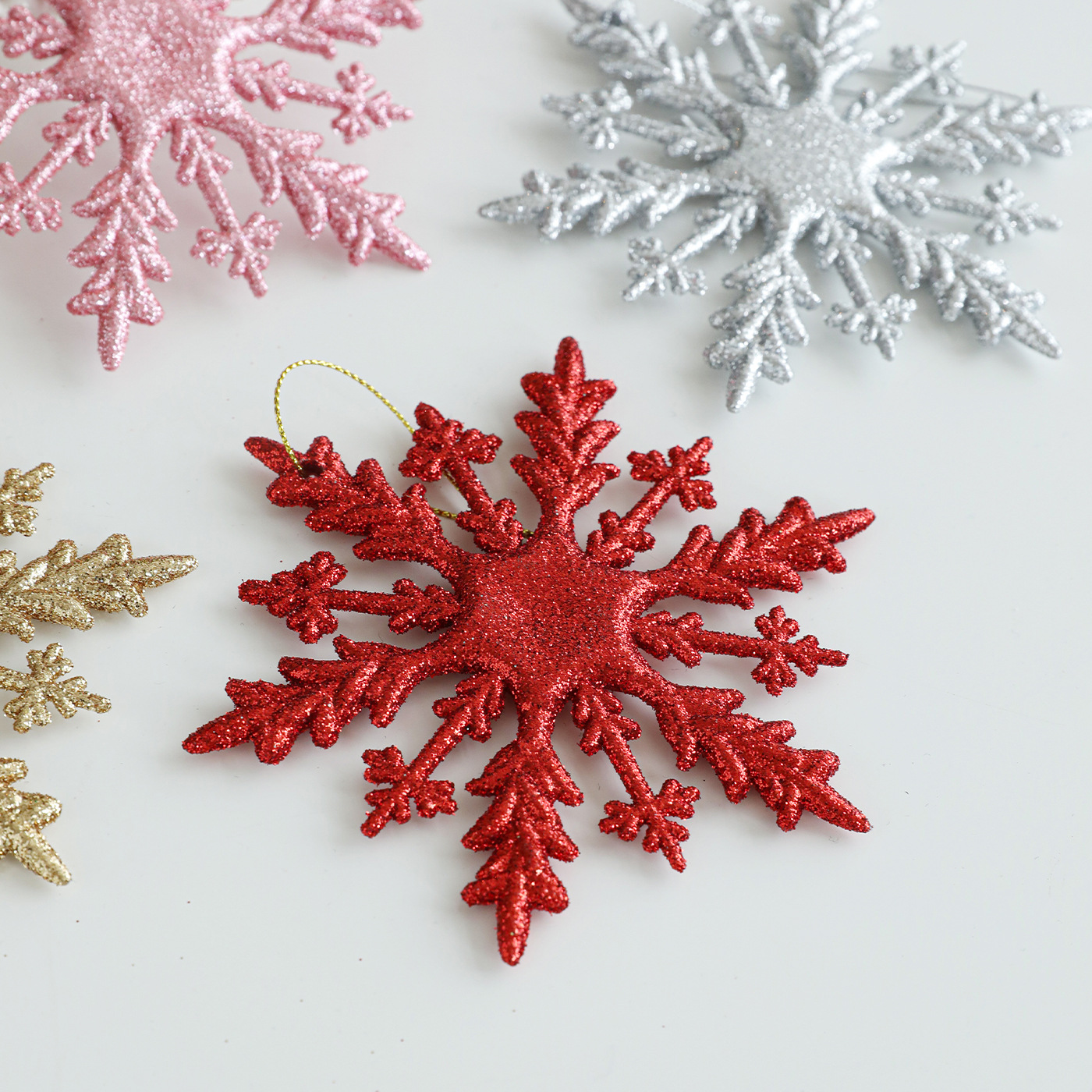 Nuevo transfronterizo 11CM plástico adhesivo flocos de nieve colgante caja de árbol de Navidad accesorios de decoración accesorios de color