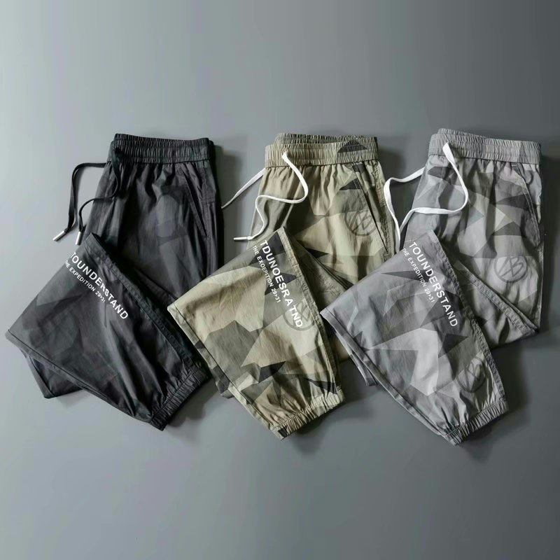 Pantalones de los hombres de verano delgado estilo coreano de moda hasta el tobillo pantalones deportivos casuales pantalones sueltos de camuflaje de los hombres