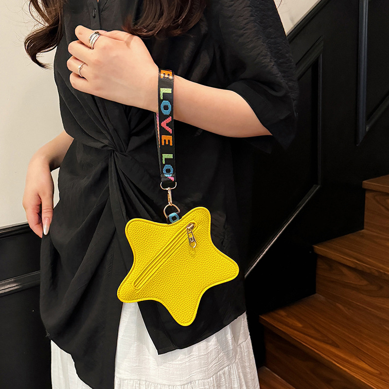 Tendencia de moda transfronteriza nueva forma de estrella de color sólido estilo occidental sentido de diseño de nicho casual bolso de mano para mujer