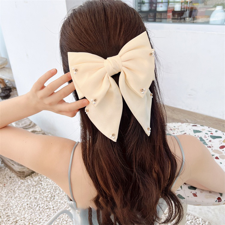 Women's Simple Style Bow Knot Cloth Rhinestones Pearl Hair Clip display picture 2
