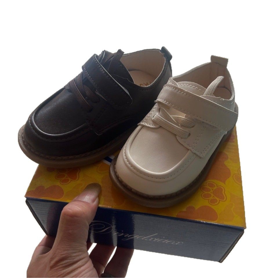 Zapatos de bebé primavera y otoño 2025 zapatos de cuero pequeños para hombres y niños, zapatos de bebé para bebés, zapatos para niños de suela blanda para niños, zapatos para niñas, cabello