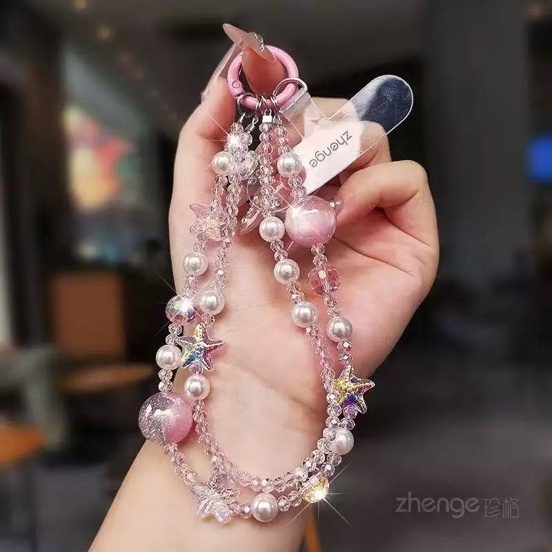 Pink crystal starfish pearl phone chain, exquisite and niche, with a high-end feel, beaded pendant, short style, outdoor case, anti-loss