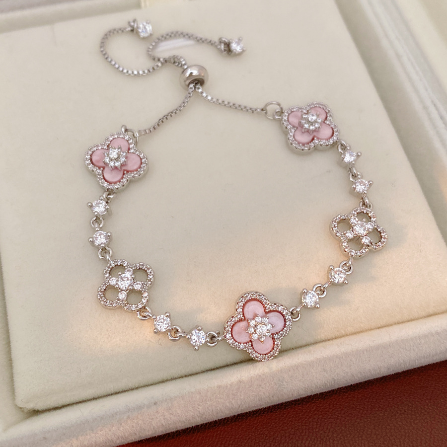 Exquisita variedad de diamantes de diamante flor hueco pulsera ligera de lujo pulsera alta sensación de moda moda joyas al por mayor