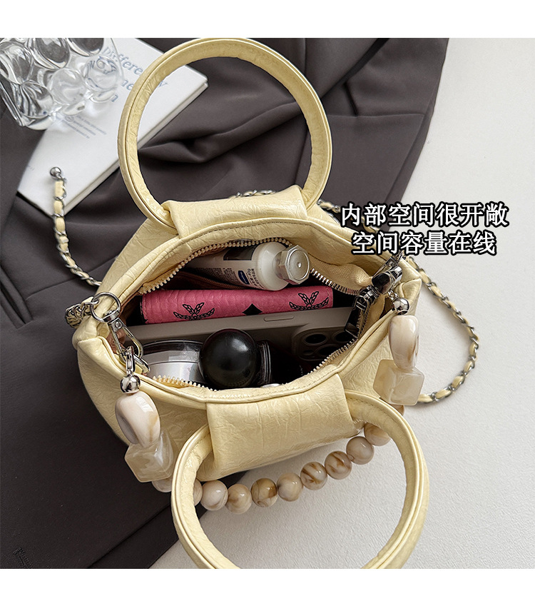 A stylish and trendy beaded bag for women, a new summer chain crossbody cloud bag for women in 2025 undefined