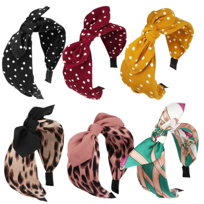 Accesorios para el cabello con estampado de leopardo Orejas de conejo anudadas versión ancha diadema hembra europea y americana placa horquilla diadema joyería al por mayor de tres Estados