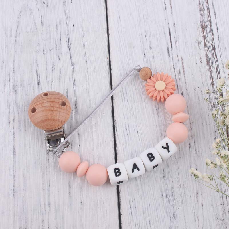 Nuevo bebé suministros de dibujos animados Margarita silicona mordedor creativo DIY nombre mordedura pegamento molar pezón cadena