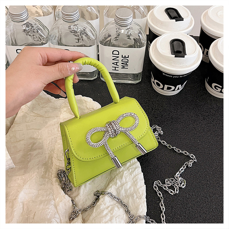 Ins niche French textured bag female 2024 new bow small square bag stylish shoulder messenger bag_voghion.com