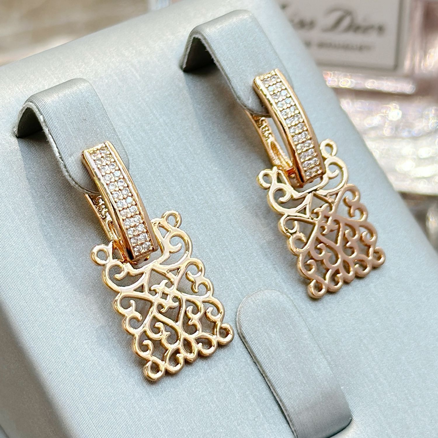 golden earrings with zircon