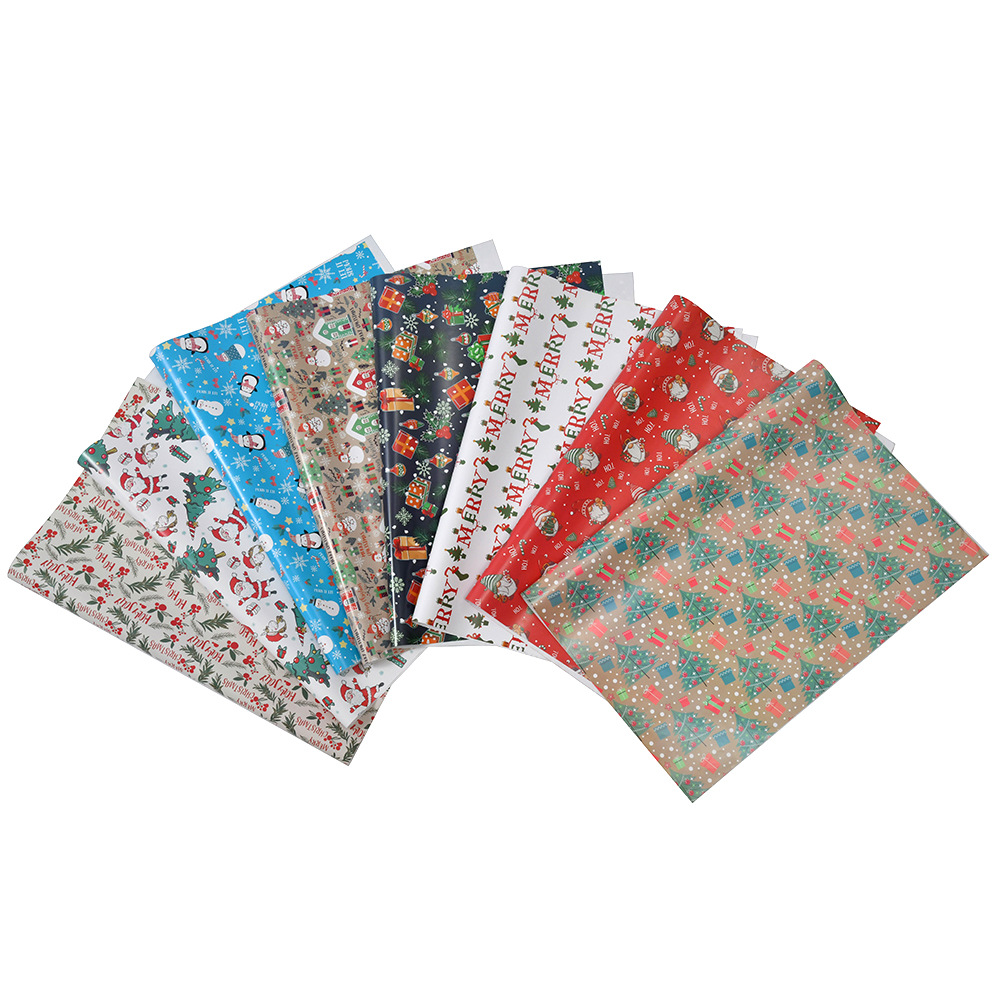 Nuevo papel recubierto brillante papel de regalo de navidad papel de regalo muñeco de nieve de dibujos animados árbol de navidad papel de regalo